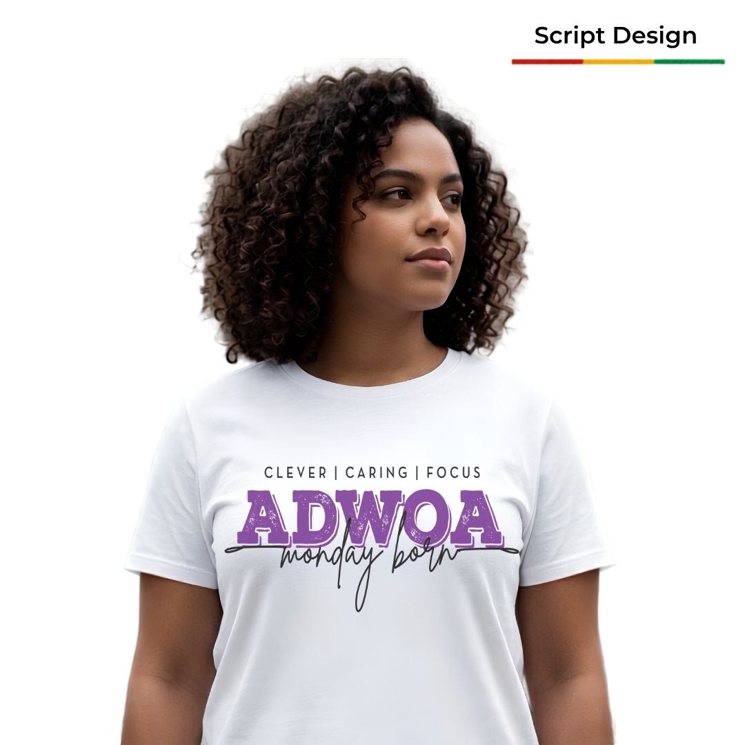 A woman with curly dark hair wearing a white graphic T-shirt. The shirt features the text 'CLEVER | CARING | FOCUS ADWOA monday born' in purple and black lettering.
