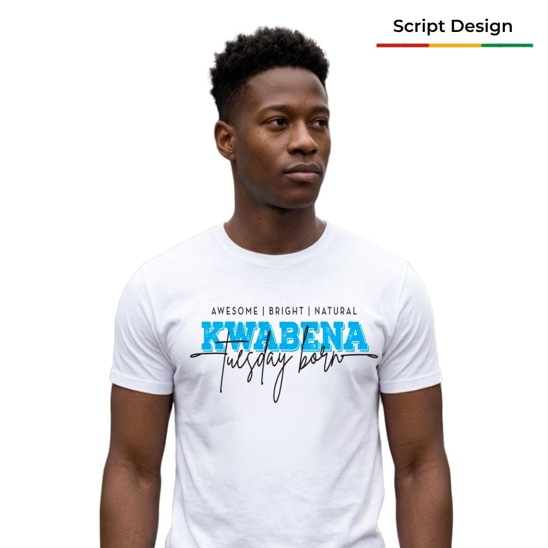 A man wearing a white graphic t-shirt with 'KWABENA Tuesday born' printed on the chest in blue and black, set against a plain white background.