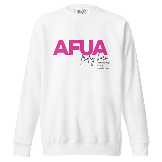 A white crewneck sweatshirt featuring a pink graphic print on the front that reads 'AFUA' in bold letters, with 'Friday Barn' in script and 'AMBITIOUS FINE AMUSING' in smaller text below.